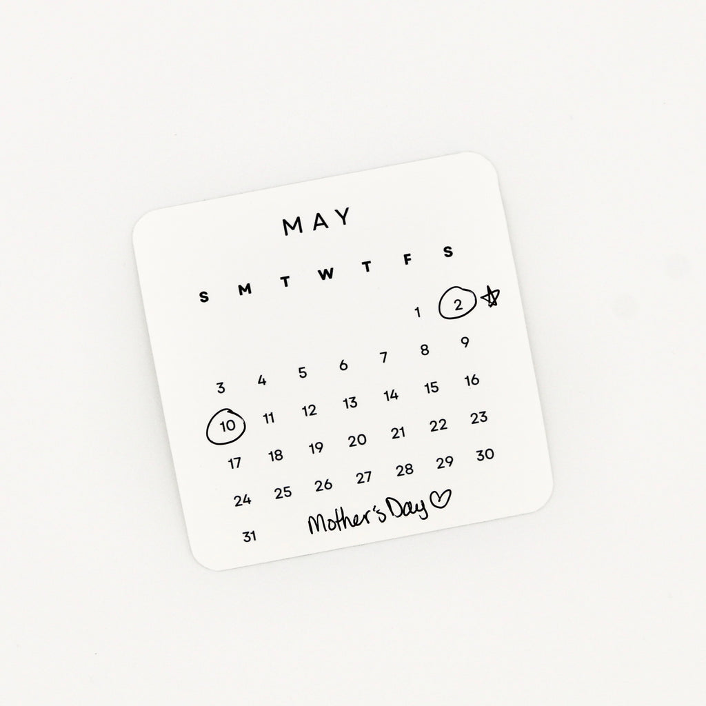 Calendar sticker for May with special dates marked on a white background
