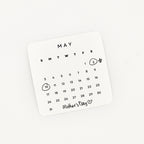 Calendar sticker for May with special dates marked on a white background