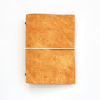 Yellow journal on a white background