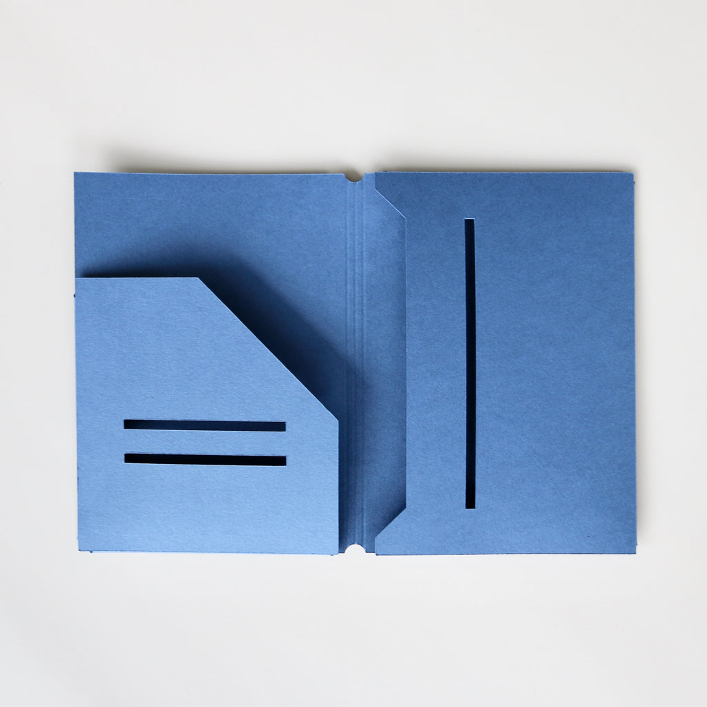 Blue folder with cut-out design on a white background