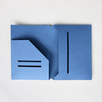 Blue folder with cut-out design on a white background