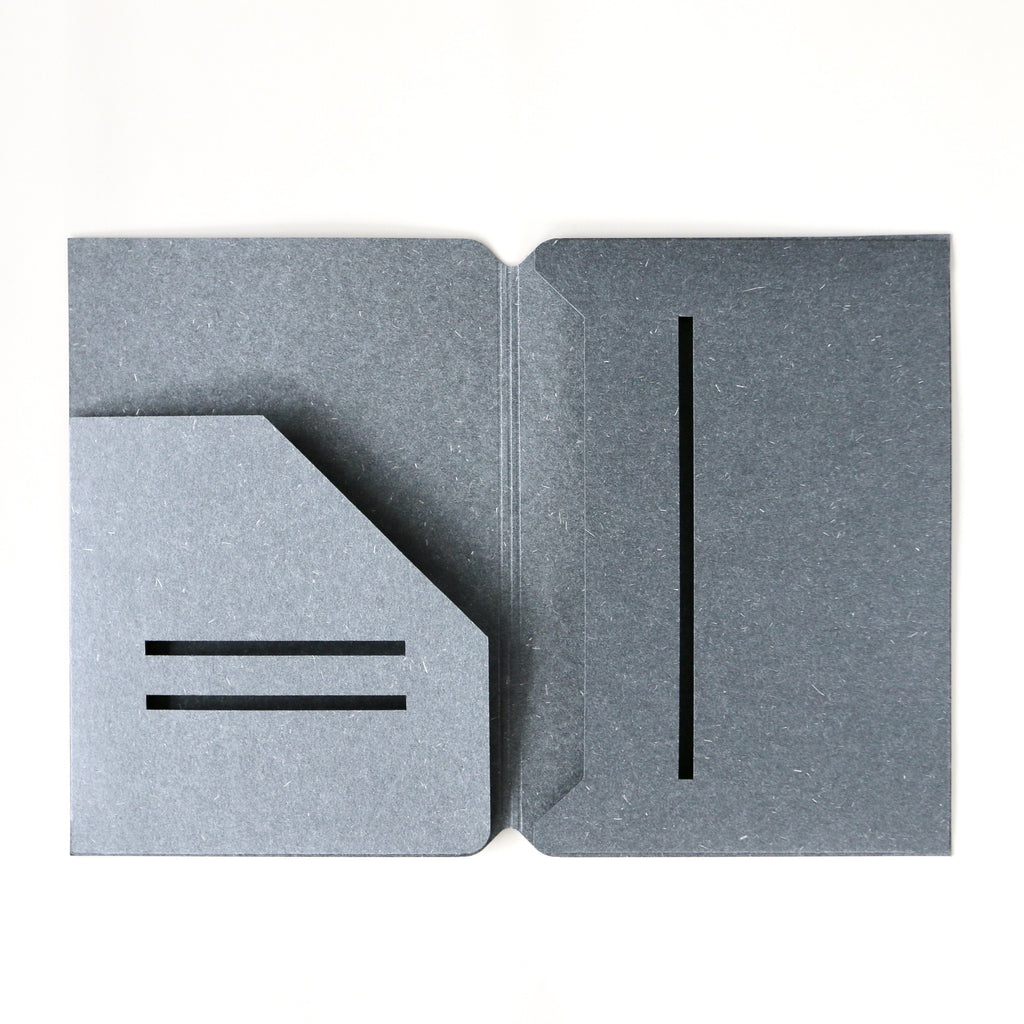 Gray textured folder with cut-out design on a white background