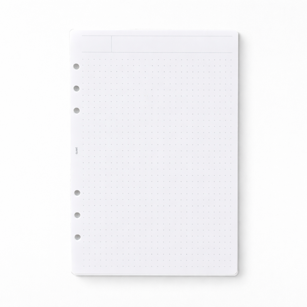 White planner refill page with perforated edges on a white background