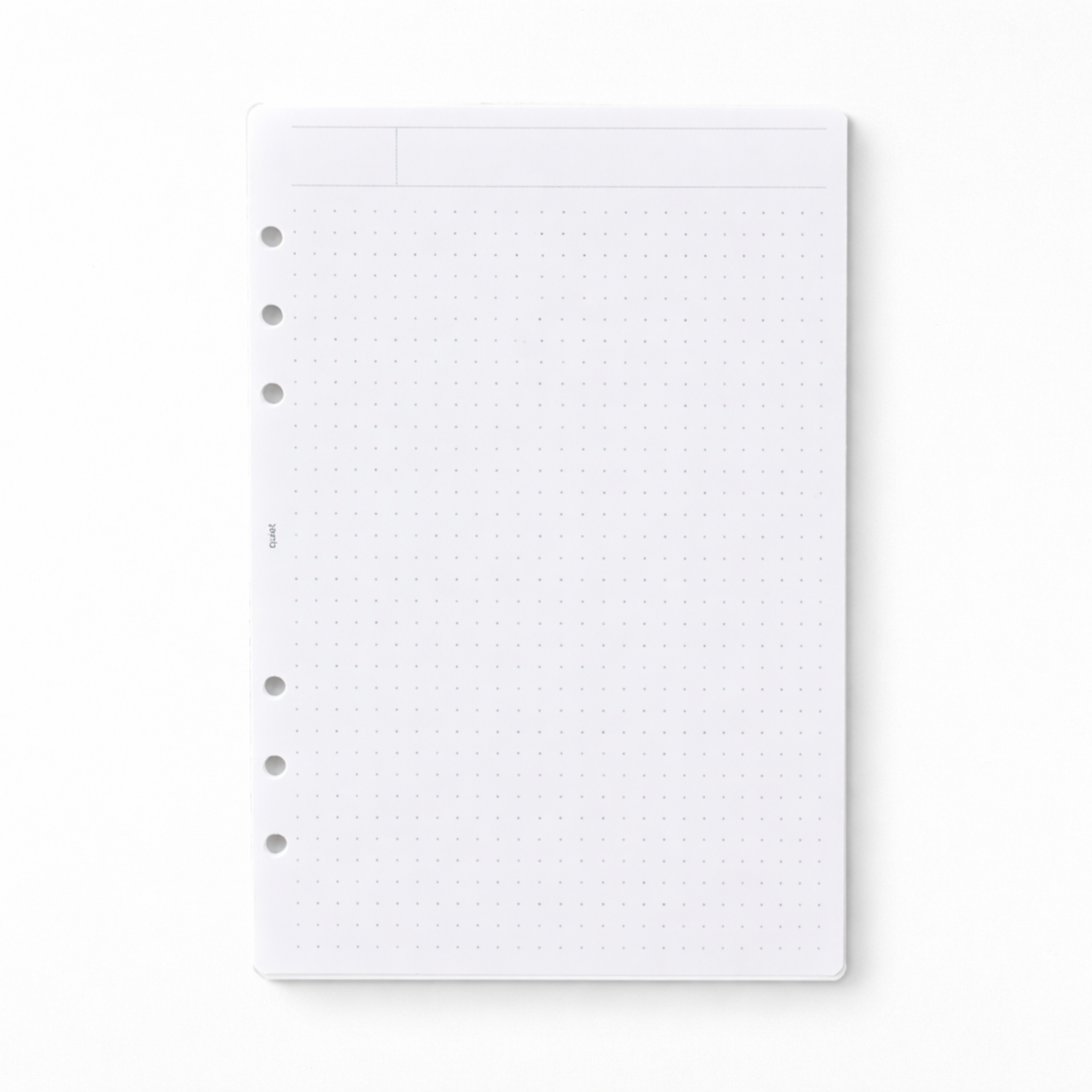 White planner refill page with perforated edges on a white background