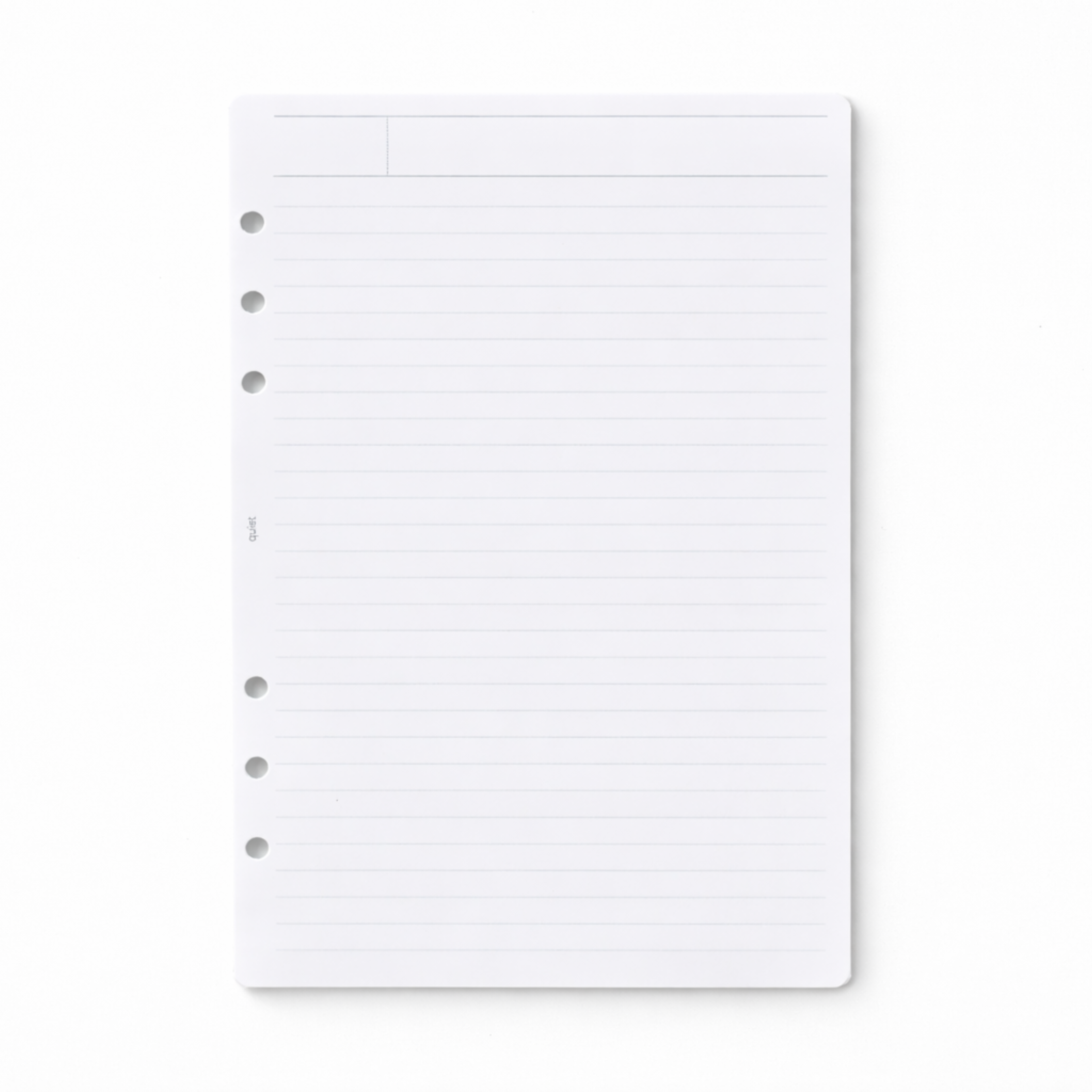 Sheet of lined paper with three holes on a white background