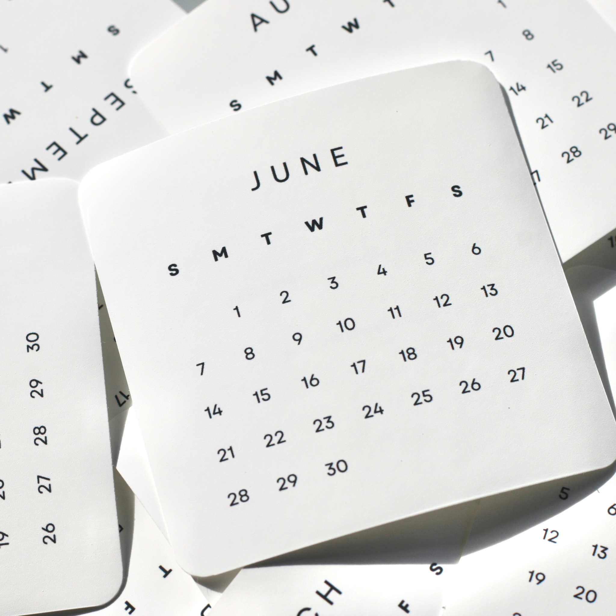 Calendar pages showing June on a white background